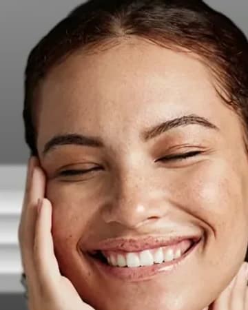 A beauty consumer engaging with a personalized beauty experience on a phone